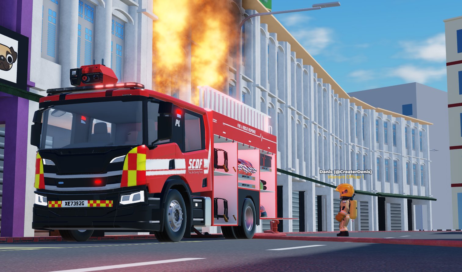 SCDF fire truck responding to a building fire in Singverse