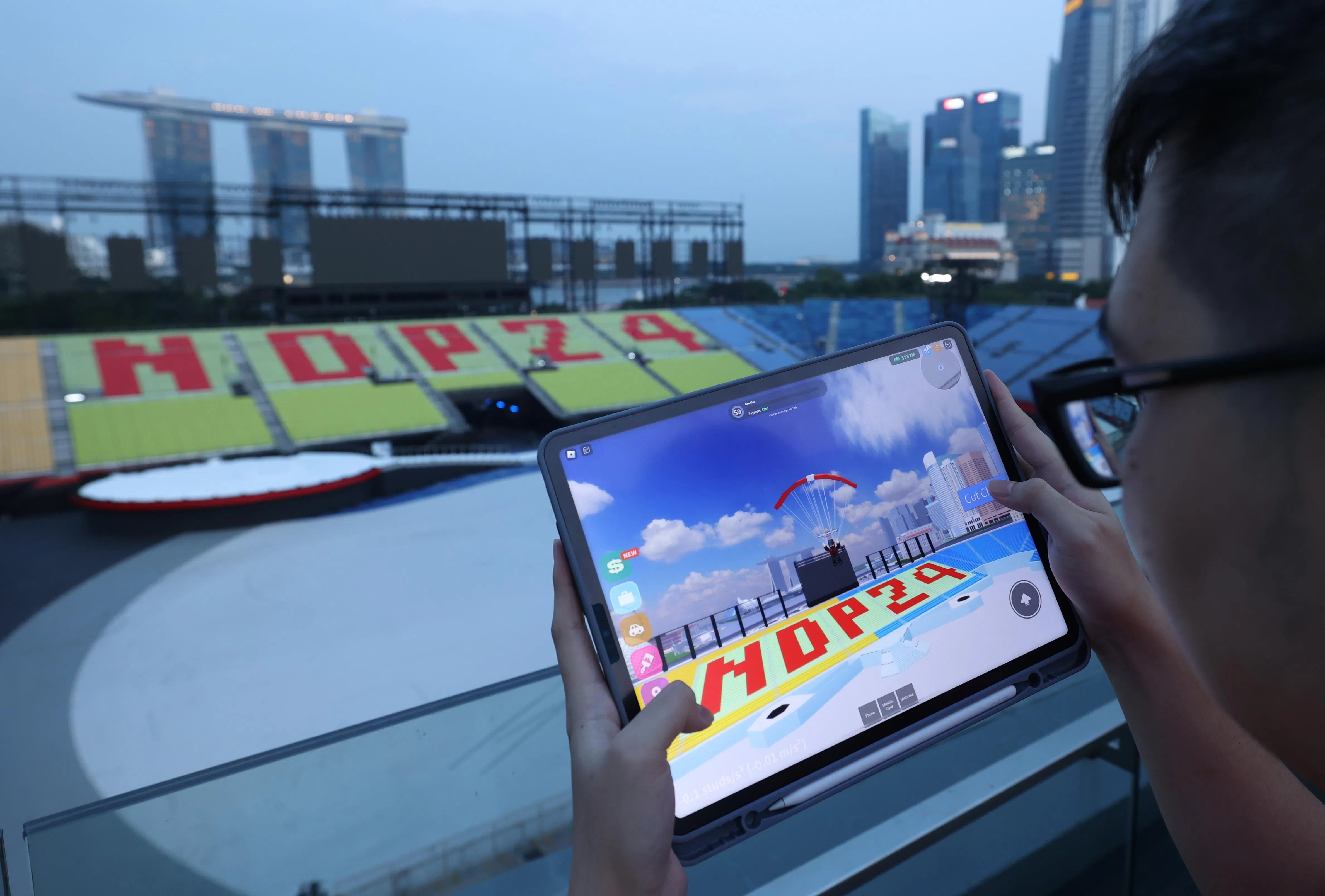 Playing Singverse at NDP 2024 with Marina Bay Sands in background